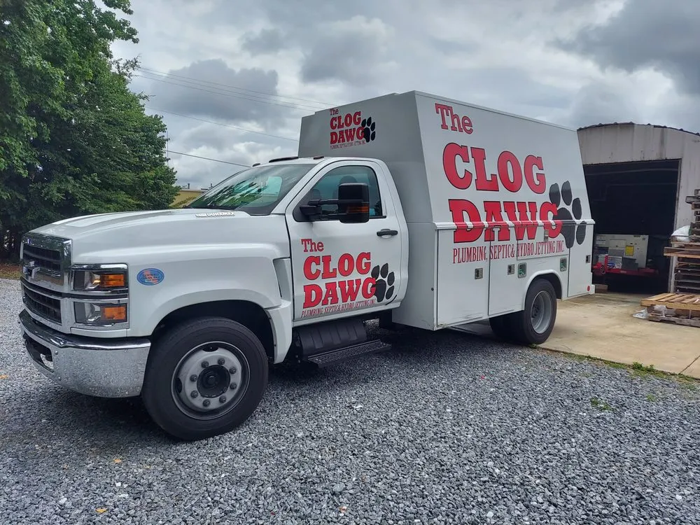 Slide of The Clog Dawg Plumbing & Hydrojetting