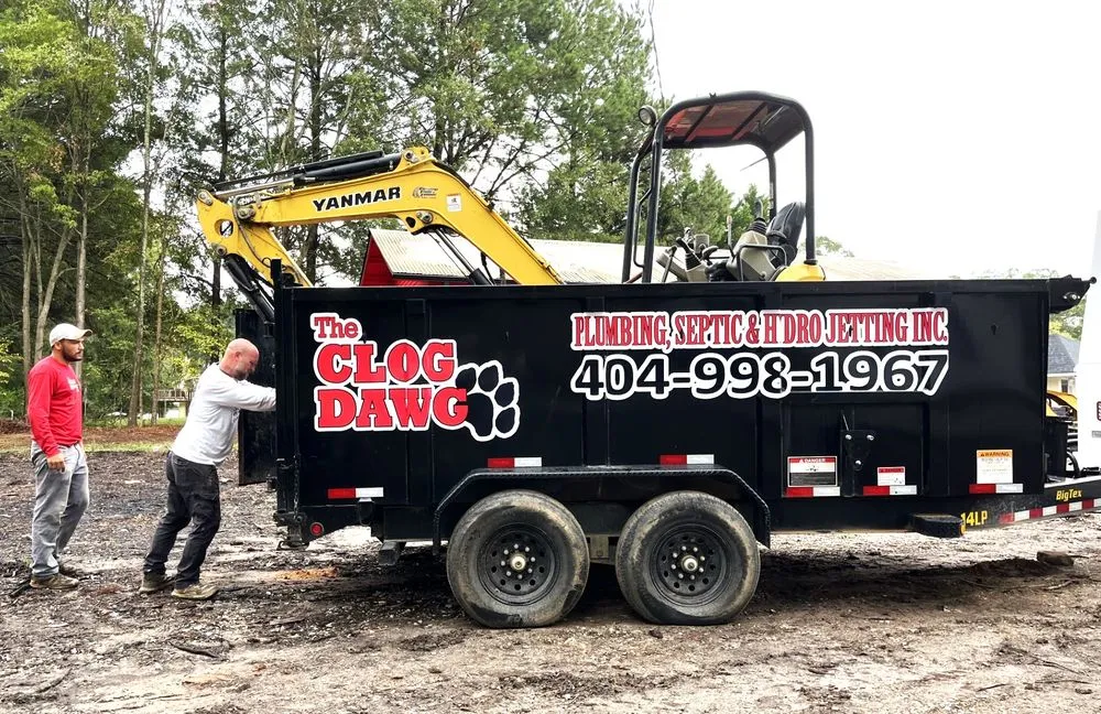 Slide of The Clog Dawg Plumbing & Hydrojetting