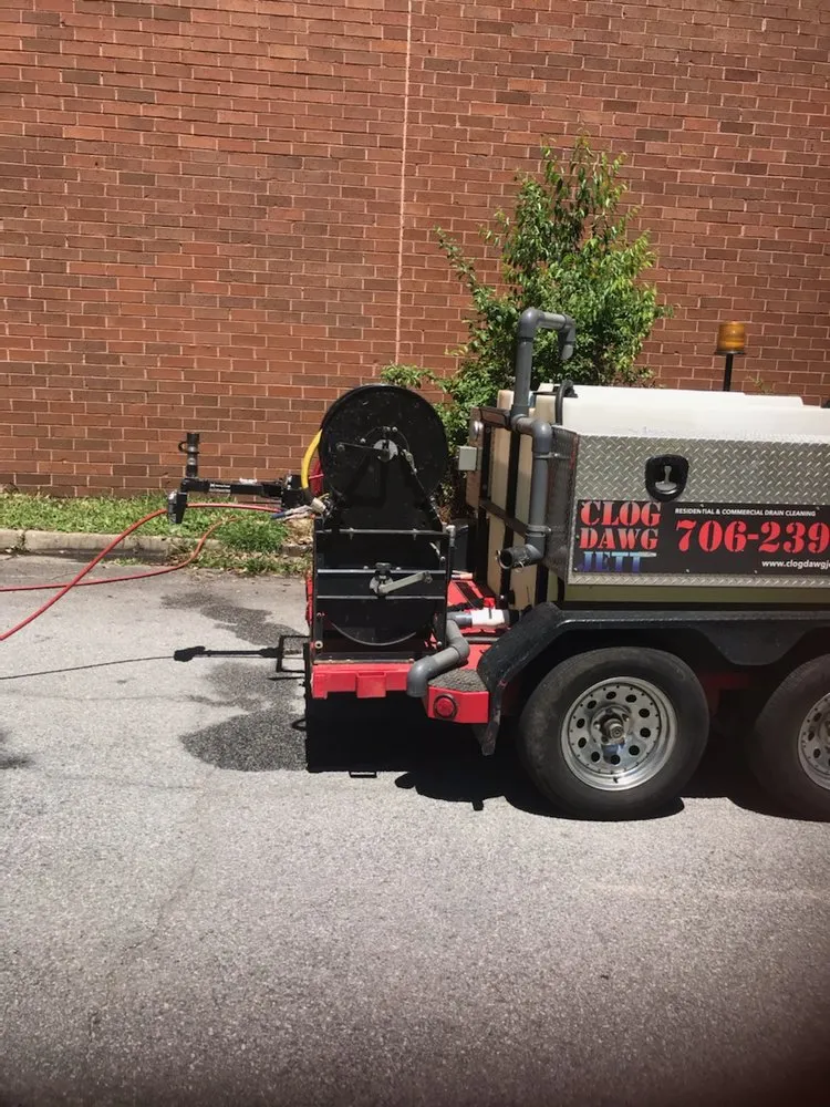 Slide of The Clog Dawg Plumbing & Hydrojetting