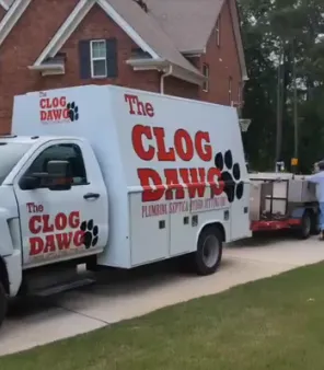 Slide of The Clog Dawg Plumbing & Hydrojetting