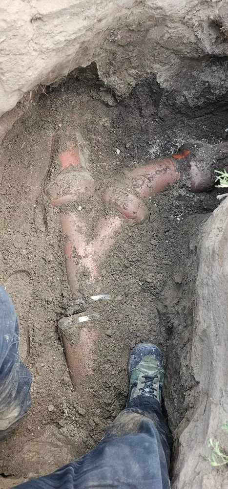 Slide of The Drain Dudes