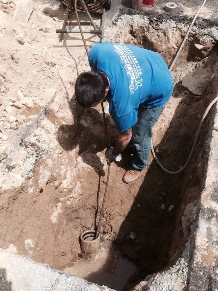 Slide of The Drain Guy