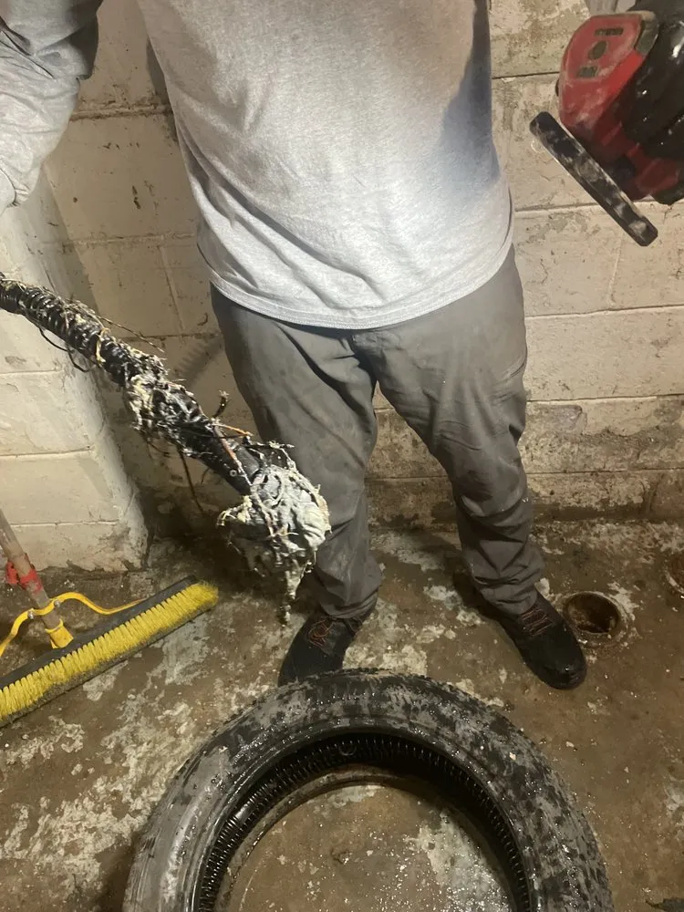 Slide of The Drain Guys