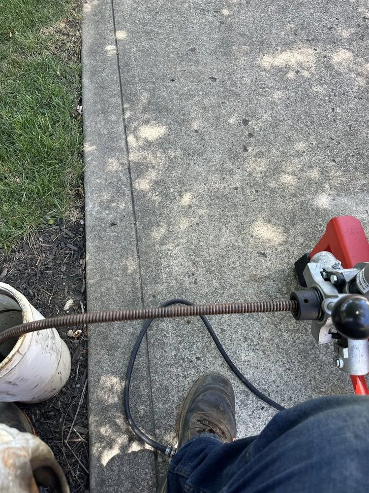 Slide of The Drain Guys