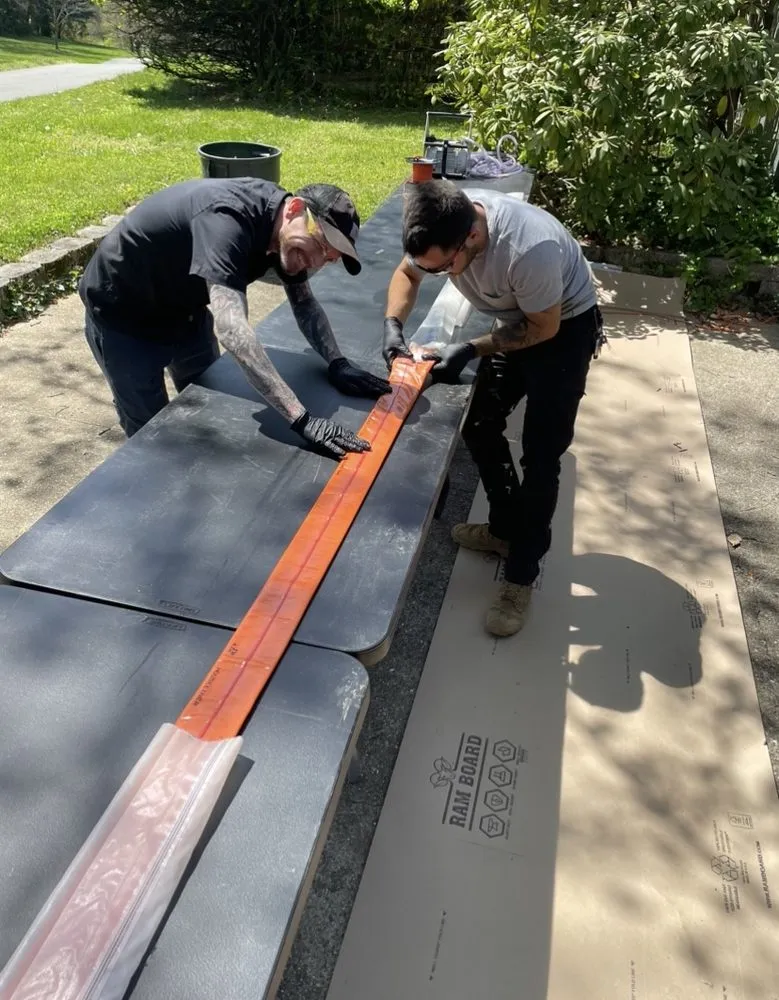 Slide of The Drain Guys