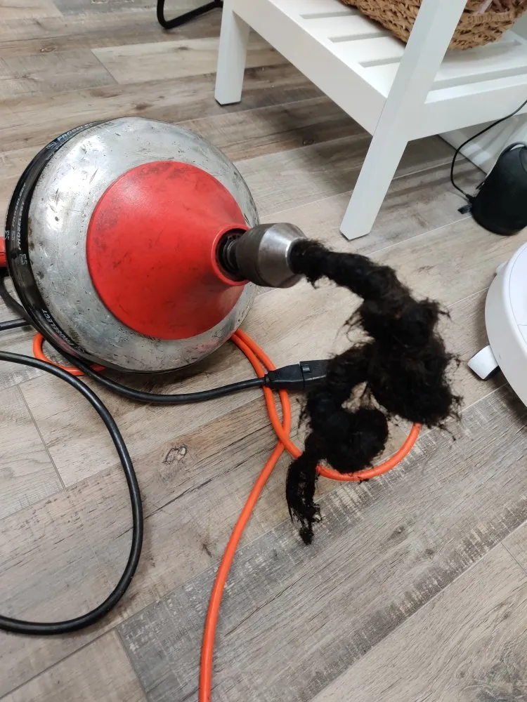 Slide of The Drain Guys