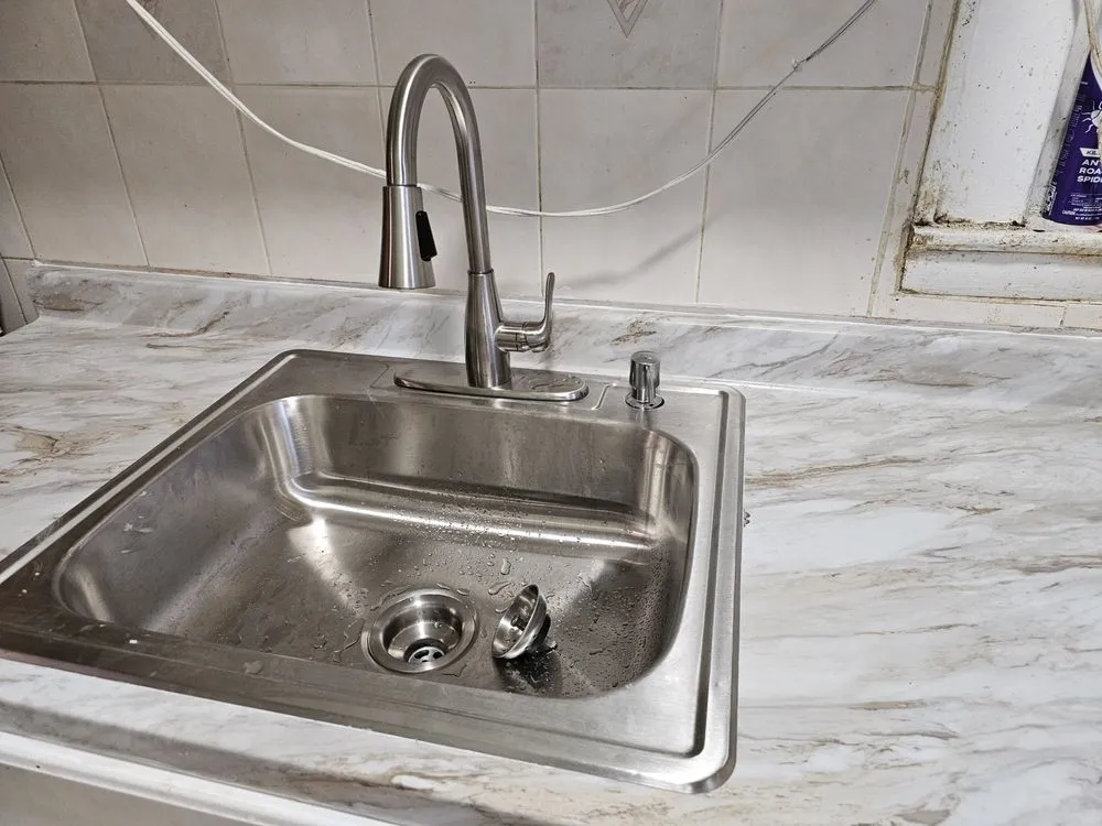 Slide of The Faucet Experts