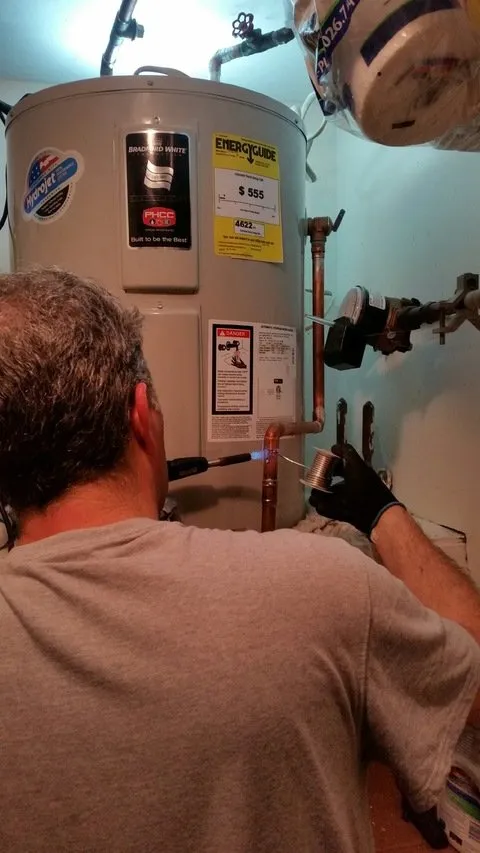 Slide of The Friendly Plumber