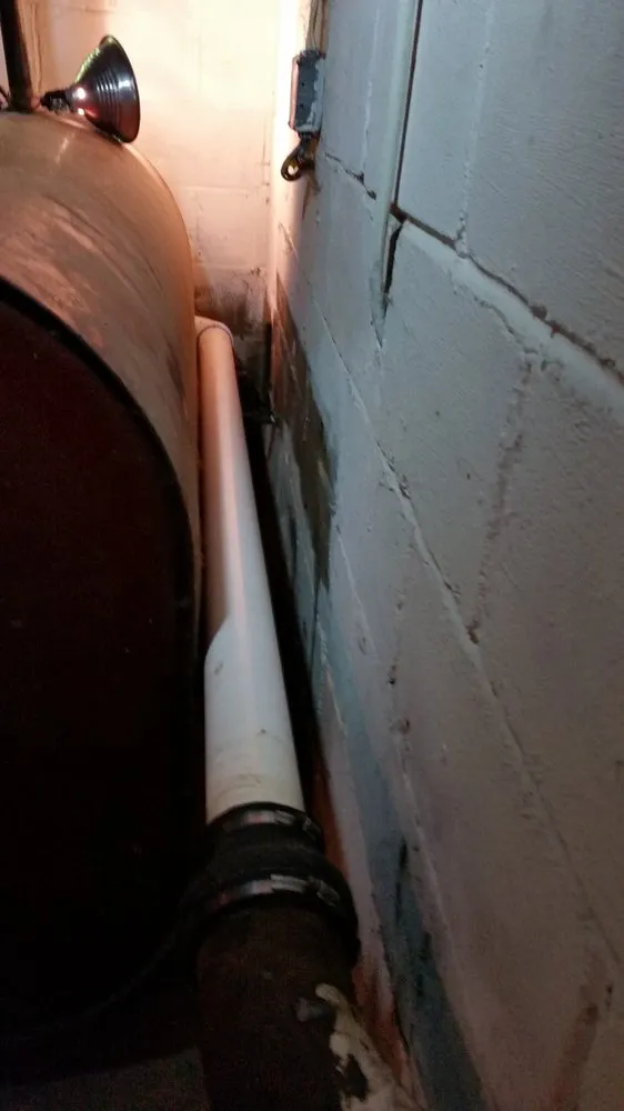 Slide of The Friendly Plumber