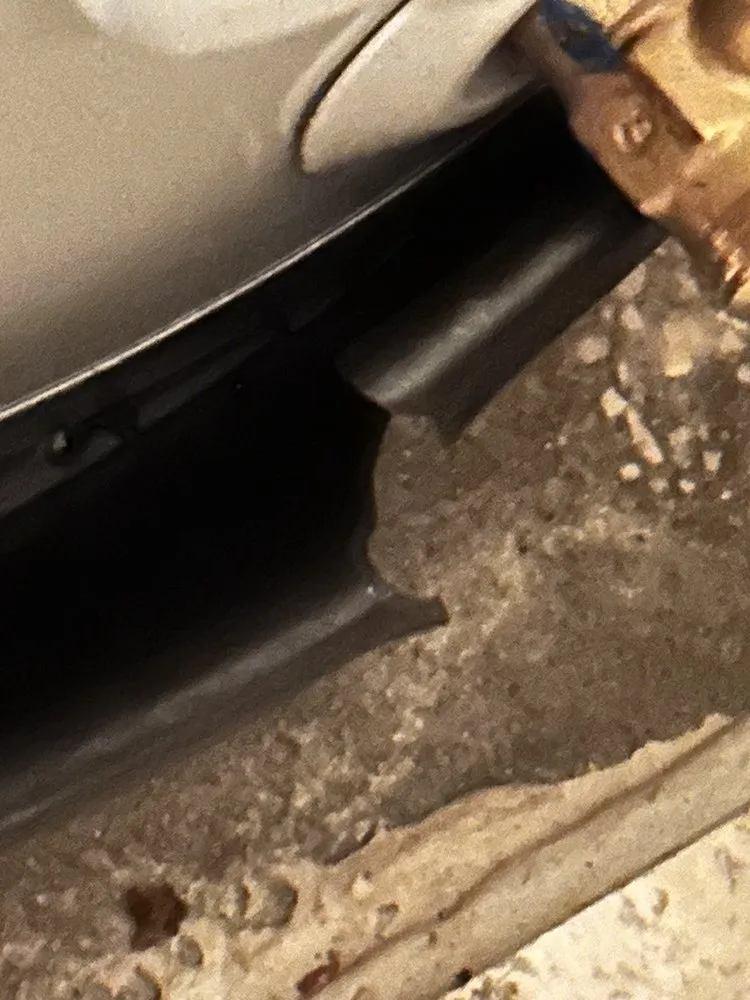 Slide of The Friendly Plumber