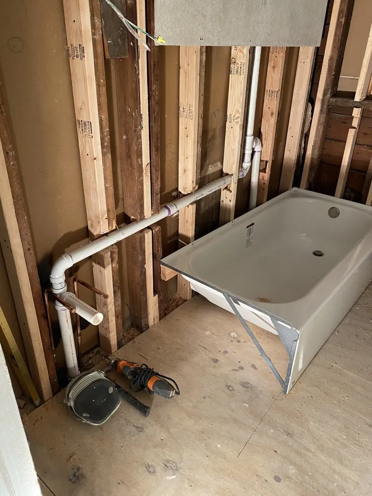 Slide of The in and out plumbing guy