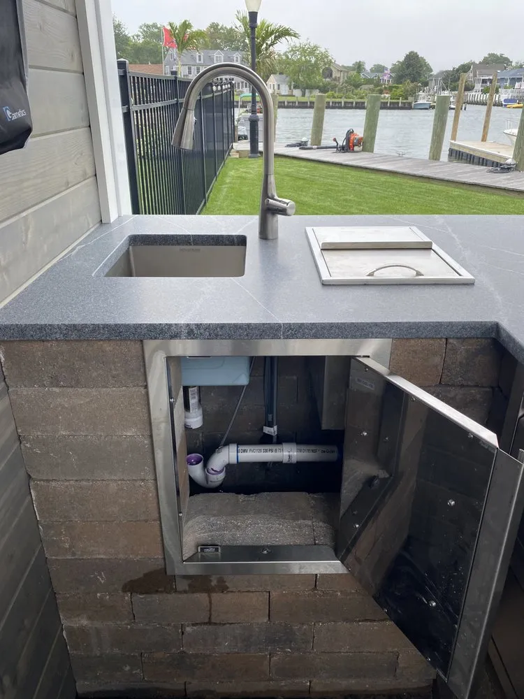 Slide of The in and out plumbing guy