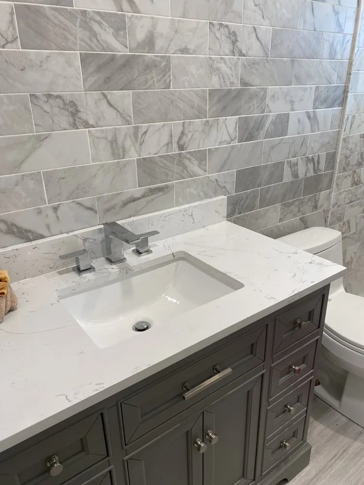 Slide of The in and out plumbing guy