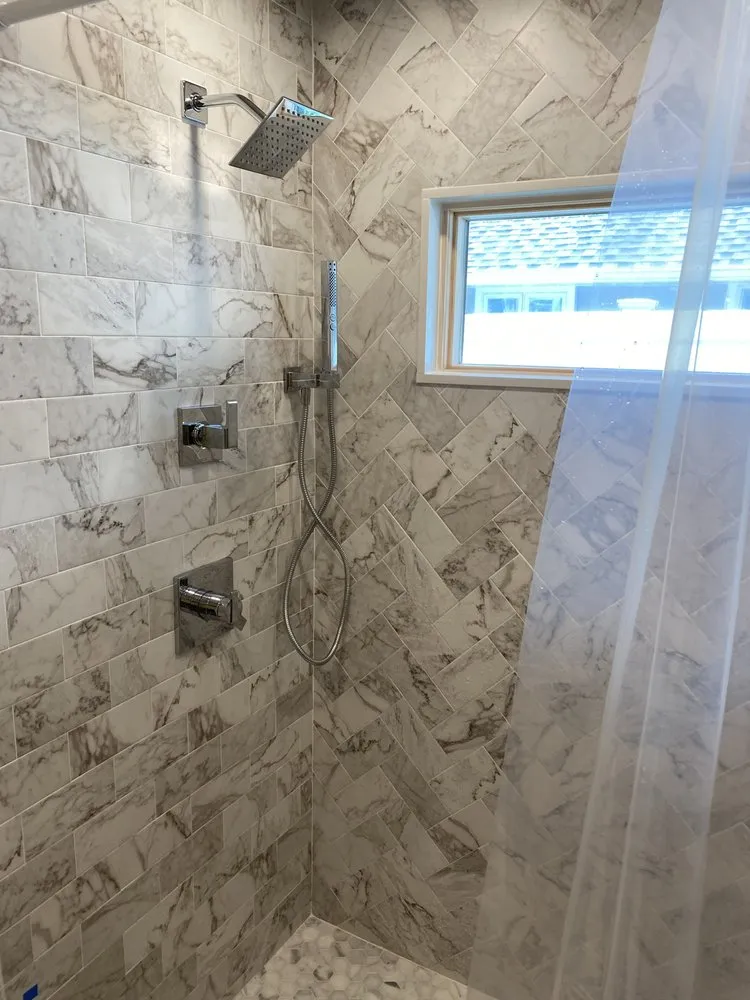 Slide of The in and out plumbing guy