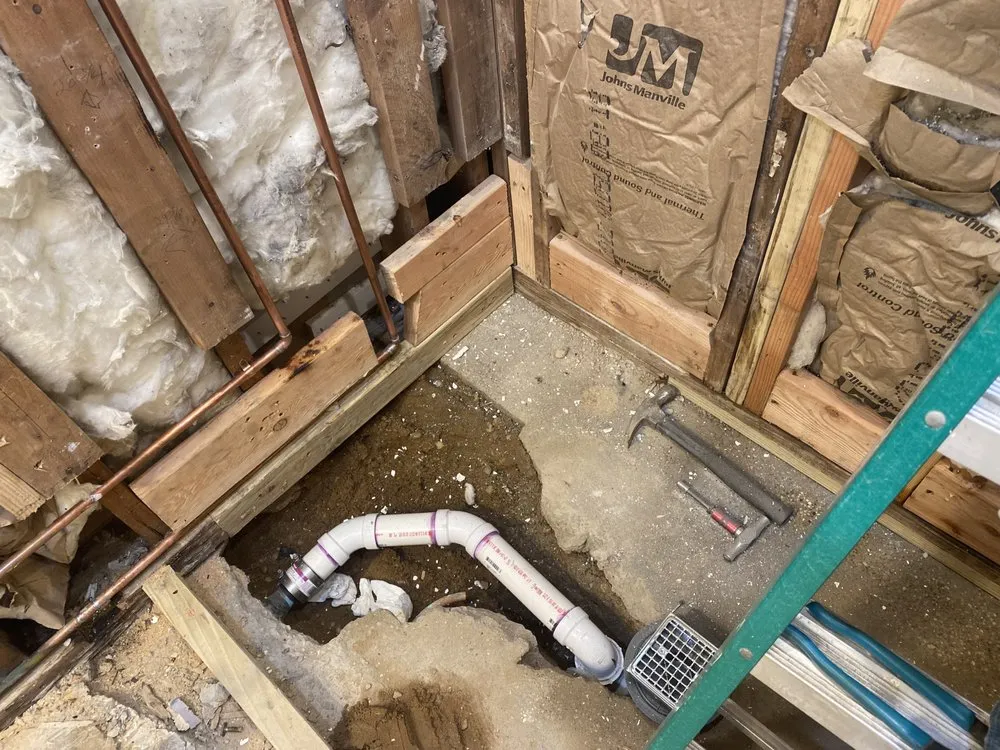 Slide of The in and out plumbing guy