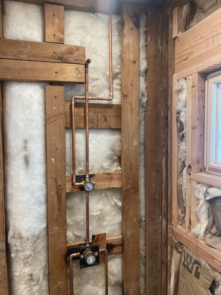 Slide of The in and out plumbing guy