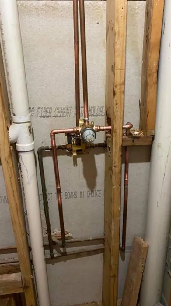 Slide of The in and out plumbing guy