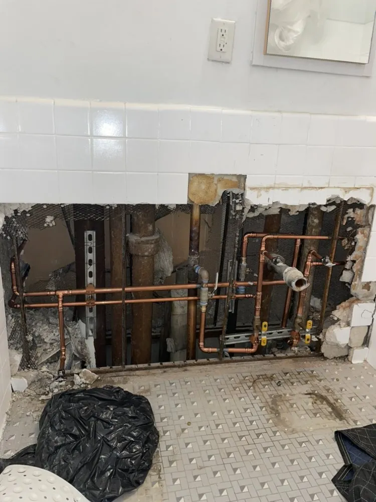 Slide of The Mark Plumbing