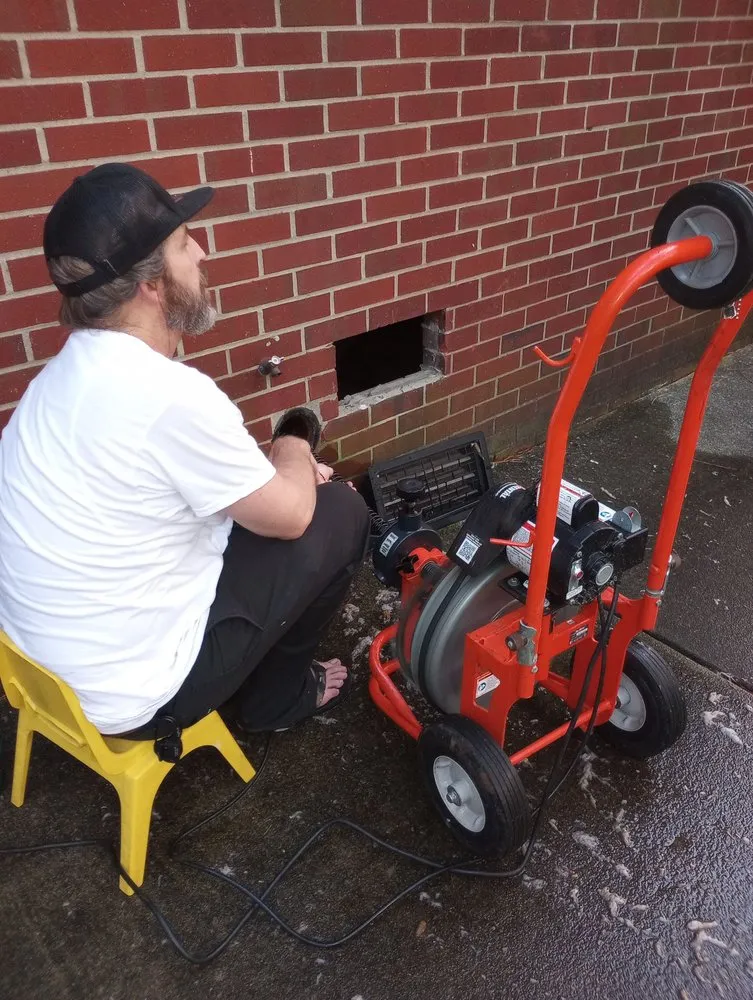 Slide of The Master Plumber