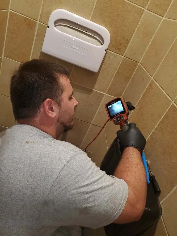 Slide of The Neighborhood Plumber