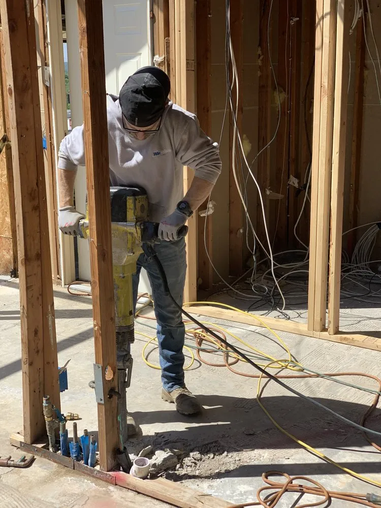 Slide of The Plumbing Brothers