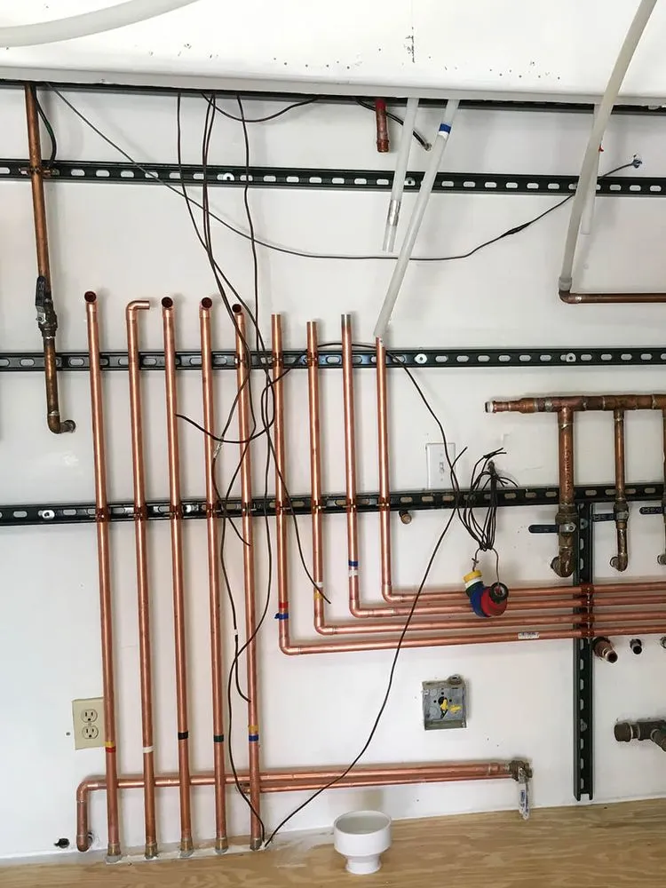 Slide of The Plumbing Company