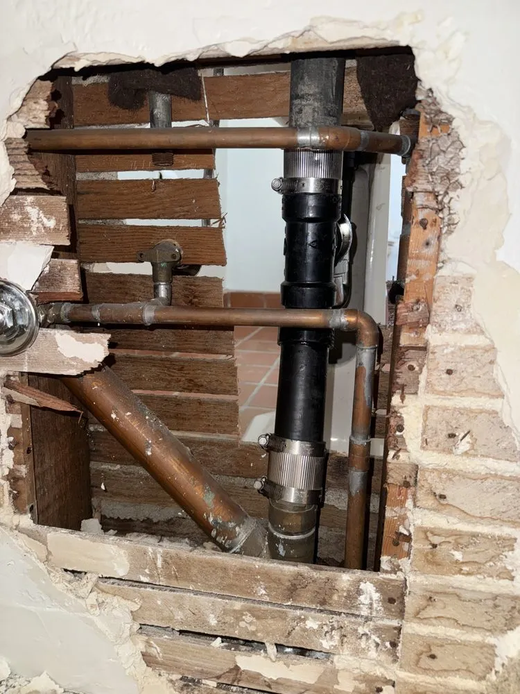 Slide of The Plumbing Crew