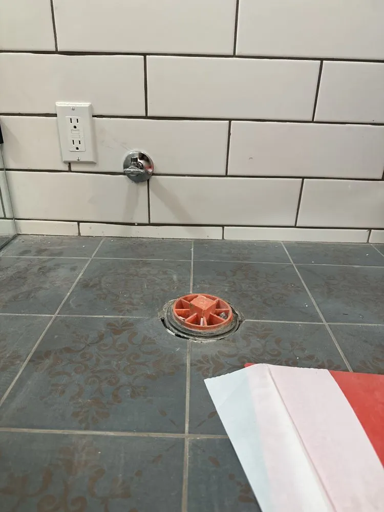 Slide of The Plumbing Crew