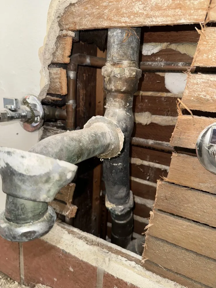 Slide of The Plumbing Crew