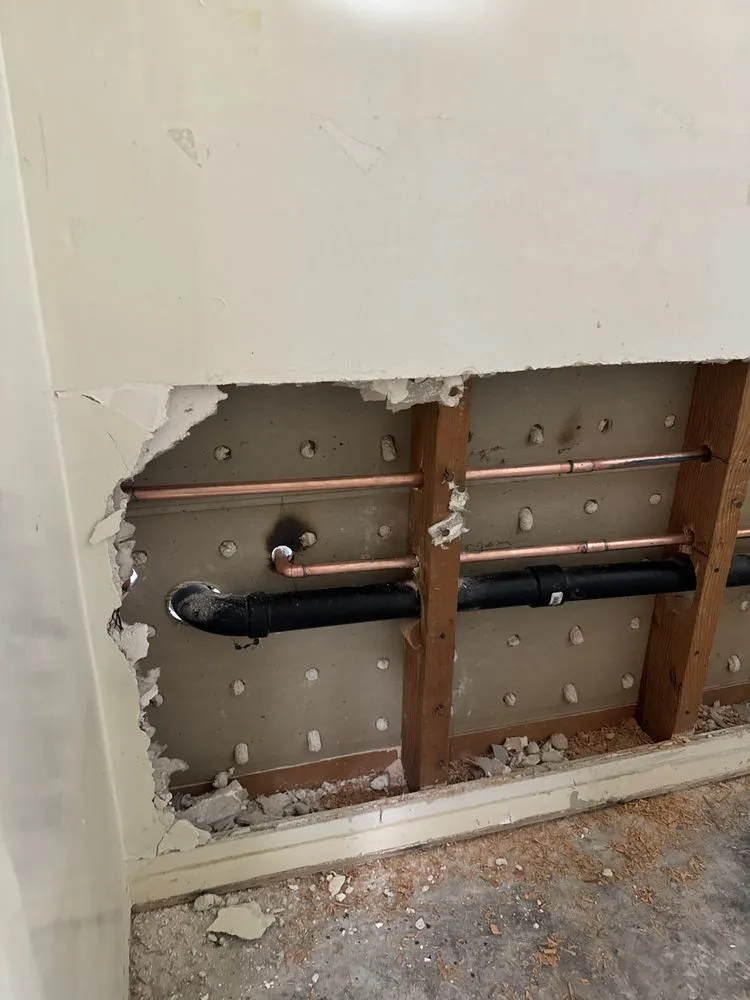 Slide of The Plumbing Crew