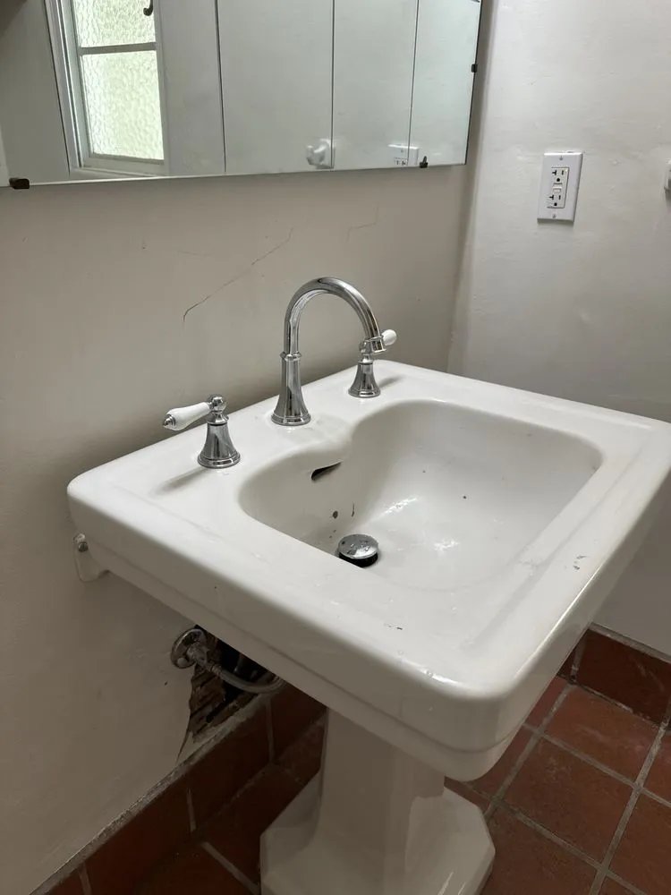 Slide of The Plumbing Crew