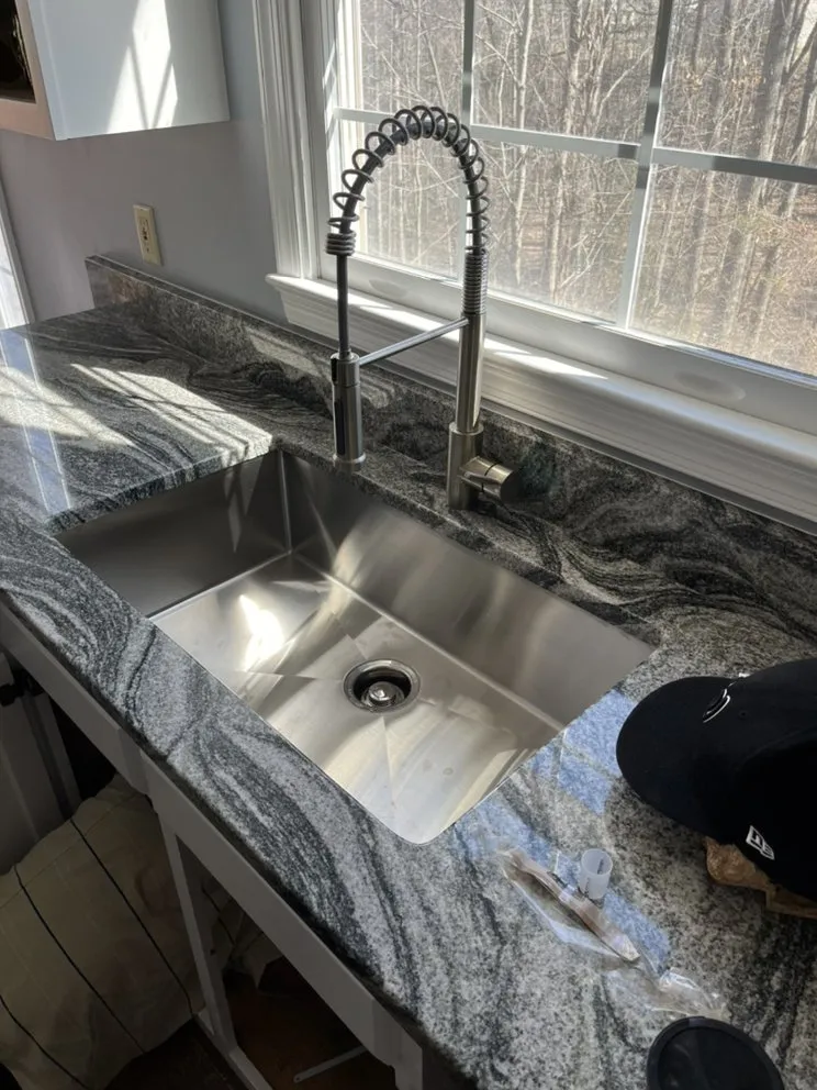 Slide of The Plumbing Guy