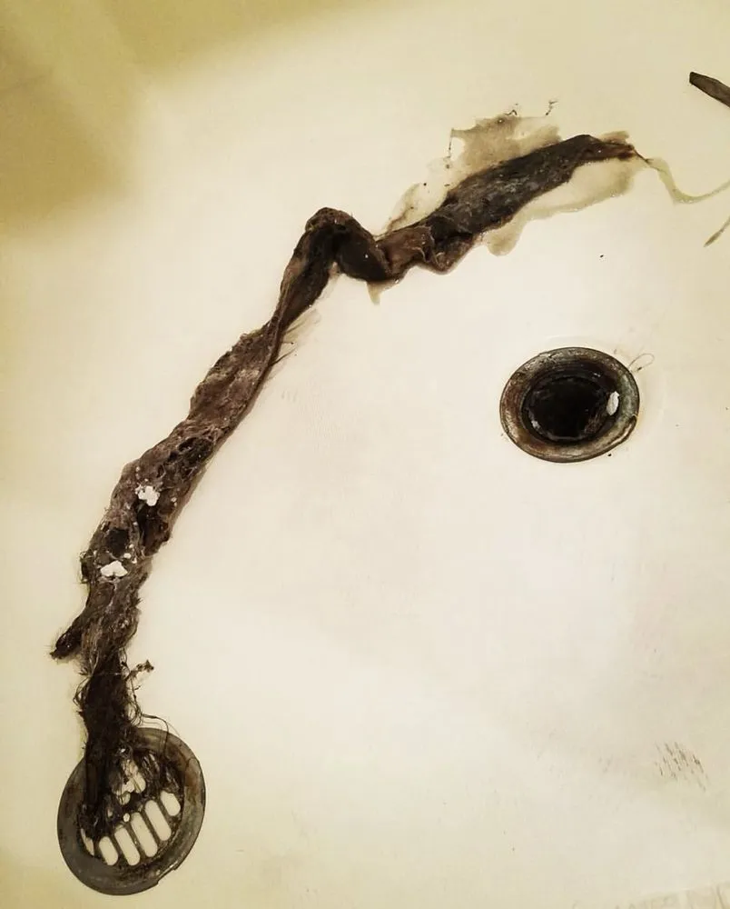 Slide of The Plumbing Guys