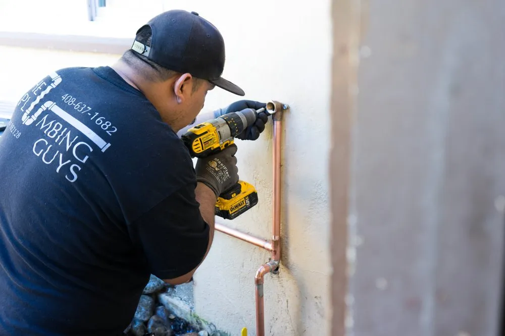 Slide of The Plumbing Guys