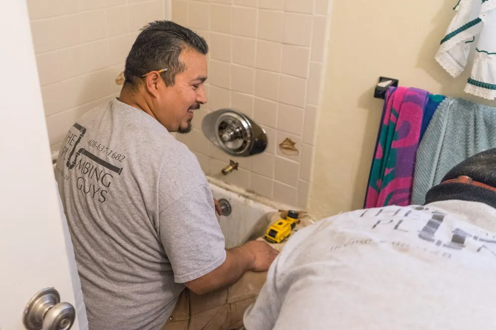 Slide of The Plumbing Guys