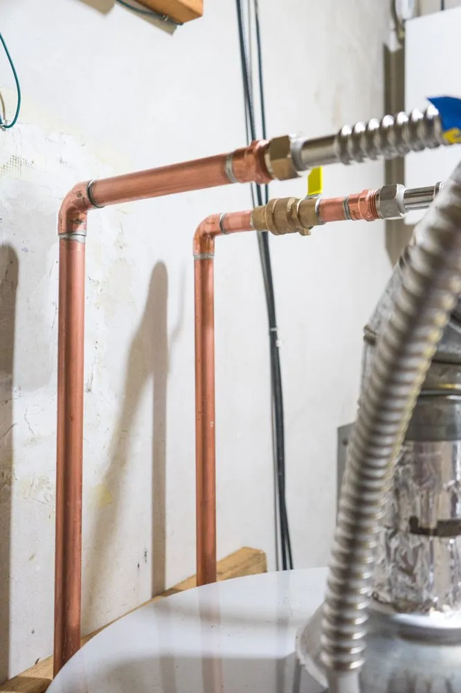 Slide of The Plumbing Guys