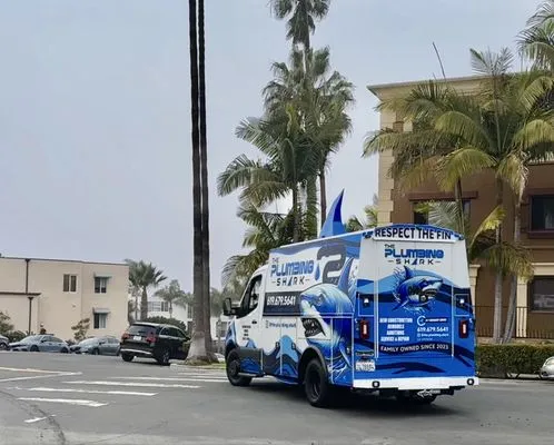 The Plumbing Shark Logo