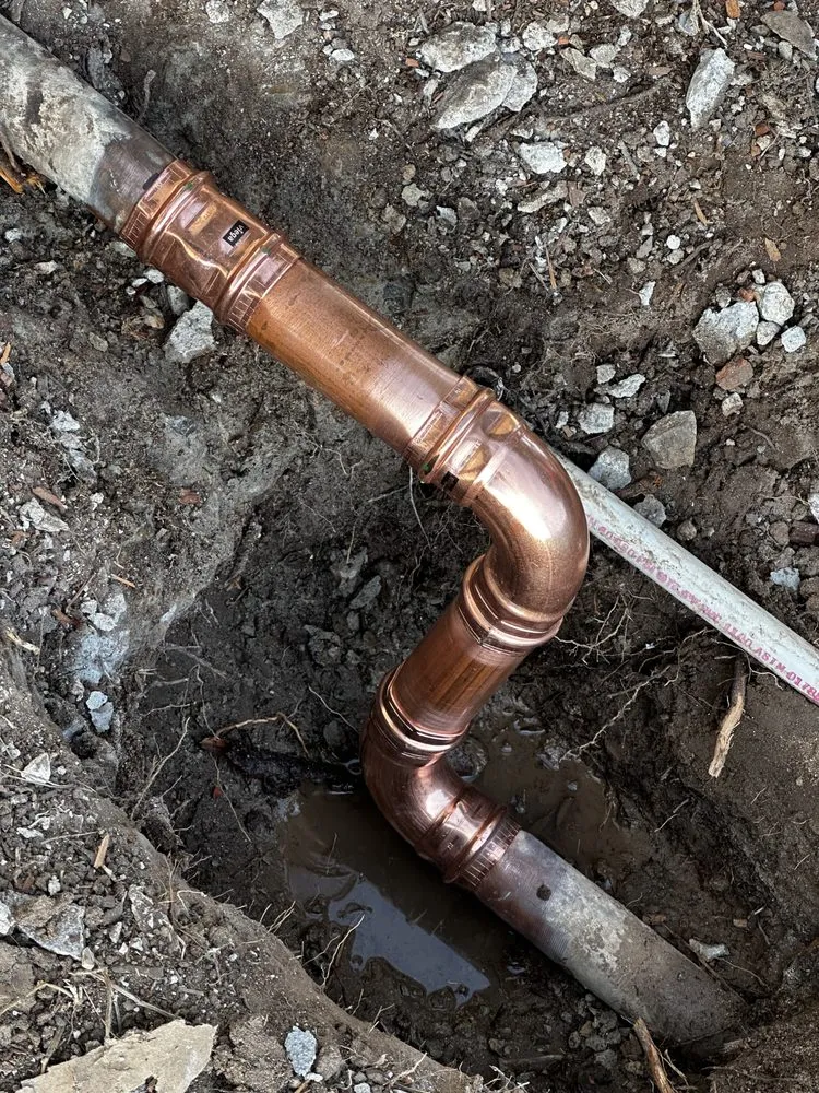 Slide of The Pro’s Plumbing and Drains
