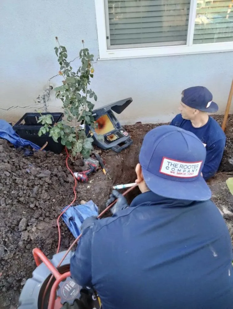 Slide of The Rooter Company