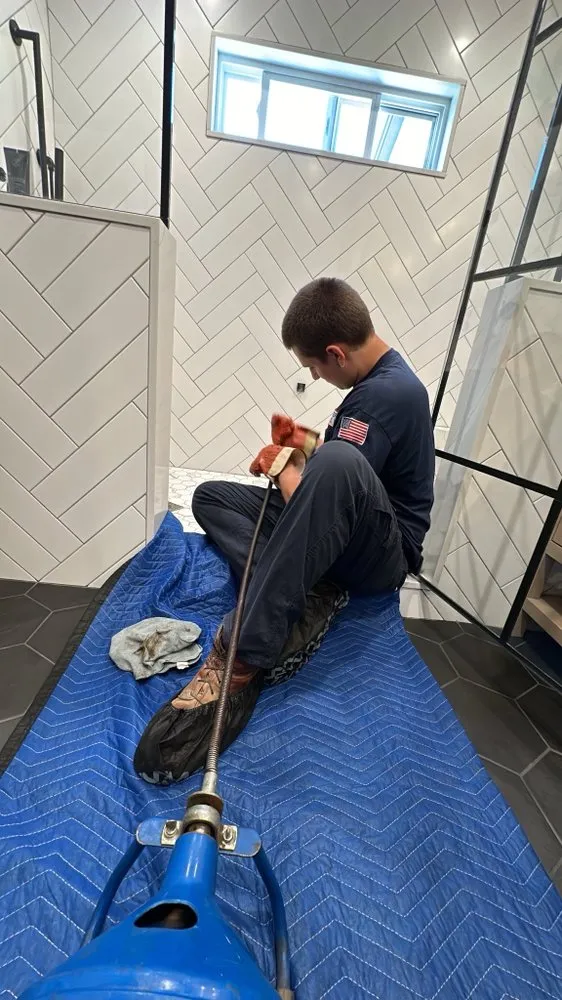 Slide of The Rooter Company