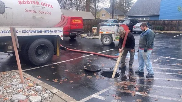 The Rooter Guys Plumbing Logo