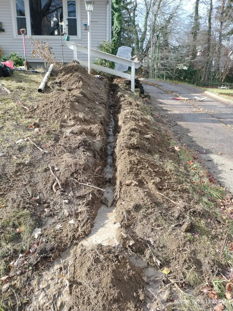 Slide of The Rooter Works Plumbing and Drains