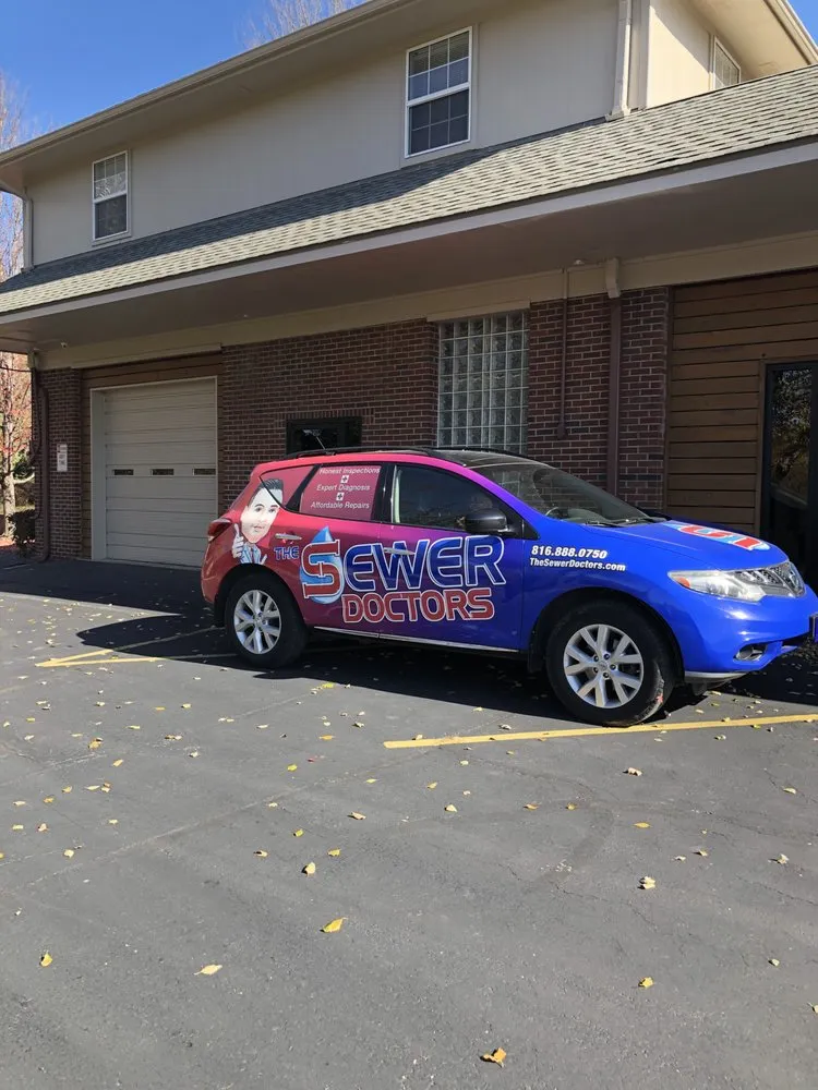 Slide of The Sewer Doctors