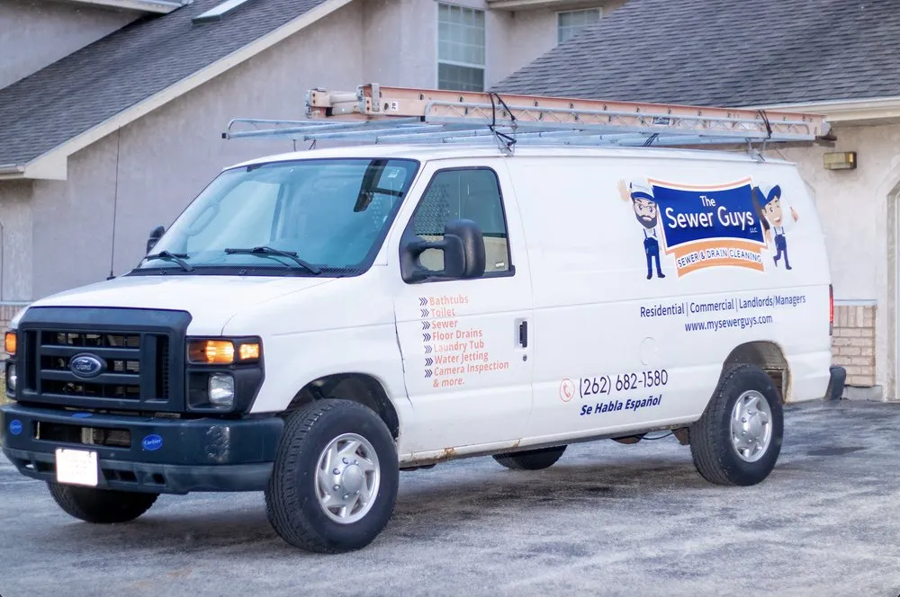 Slide of The Sewer Guys