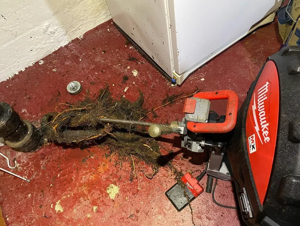 Slide of The Sewer Guys