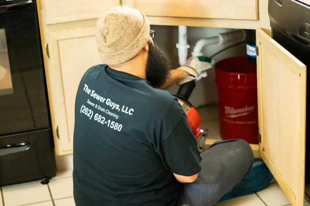 Slide of The Sewer Guys