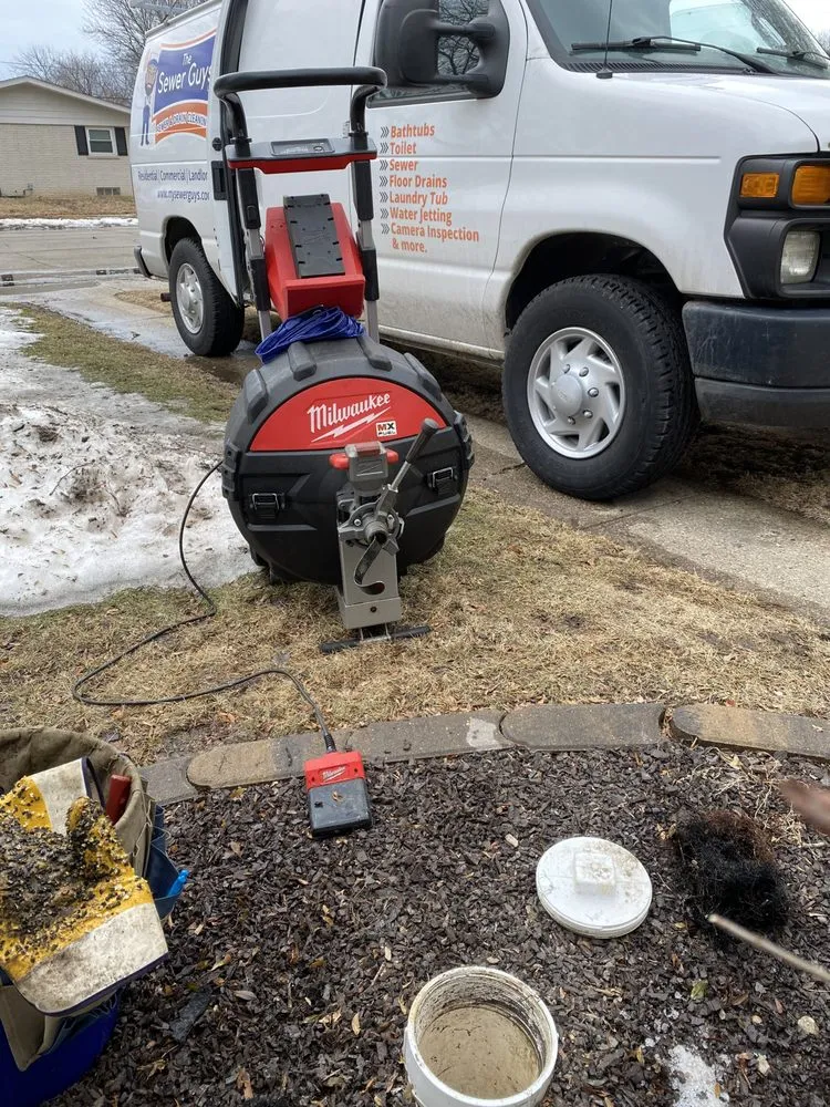 Slide of The Sewer Guys