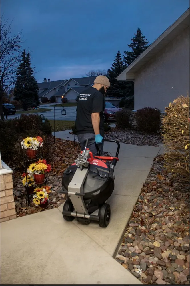 Slide of The Sewer Guys