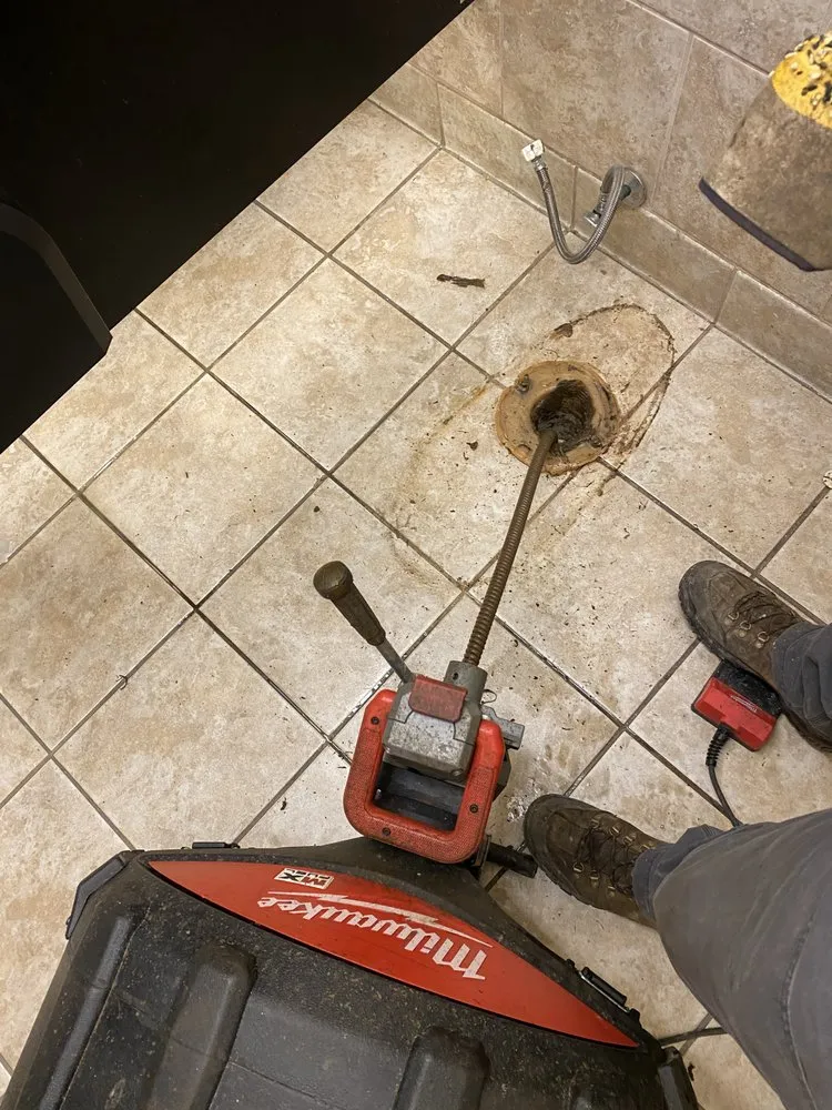 Slide of The Sewer Guys