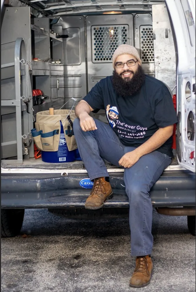 Slide of The Sewer Guys